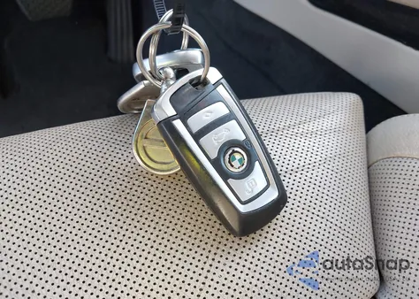 2011 BMW 740Li из США, поврежденный, VIN WBAKB4C57BC574935